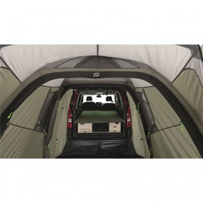 Tent against the tailgate of the car.