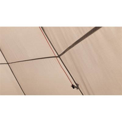 Adjust the roof ventilation in the tipi tent with ropes on the wall.