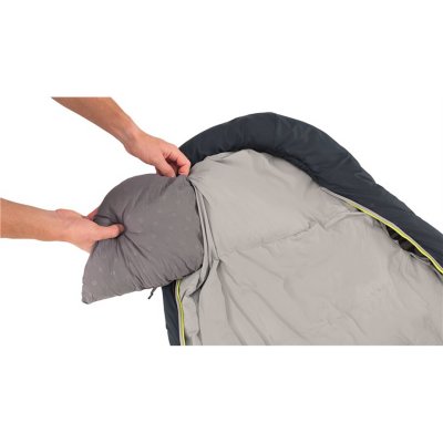 Roll up clothes and use as a pillow in the sleeping bag.