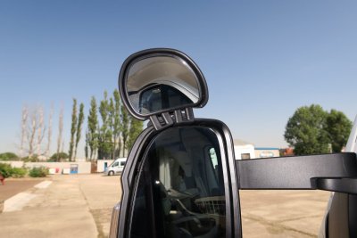 The rearview mirror makes it easy to adjust to cover the blind spot.