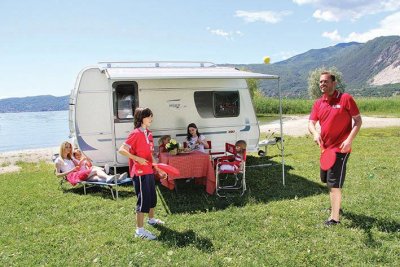 Create a sheltered patio in front of the caravan in minutes with a bag awning from Fiamma.