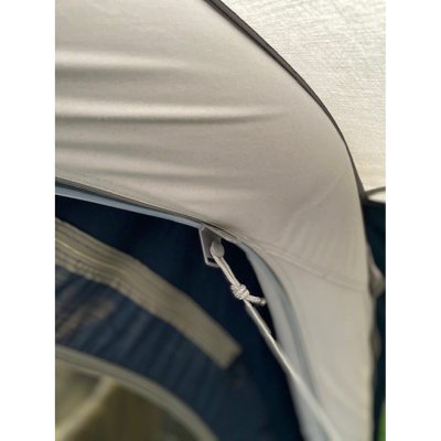 The ropes are attached to Outwell's Hook Track strips.