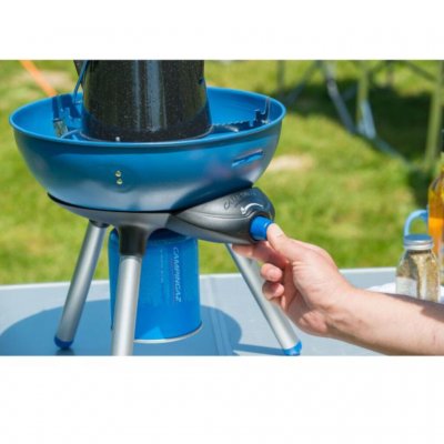 Perfect that the grill comes with a holder for pots and pans.