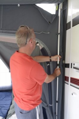 The poles are easy to attach to the awning.