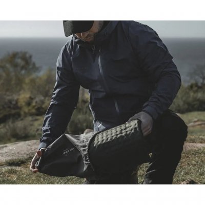 Opbergzak inbegrepen.