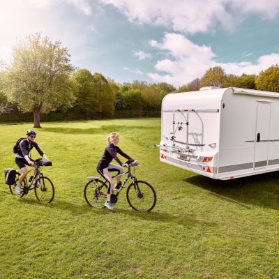 Bicycle holder for mounting on the back of a caravan.
